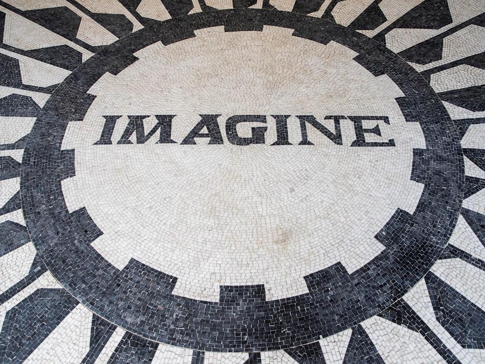 The centre of the new mosaic at Strawberry Field which reads "Imagine" in tiles