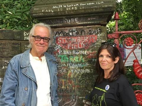 Tony Bramwell with Beatles tour guide Jackie Spencer at the Strawberry Field Liverpool gates